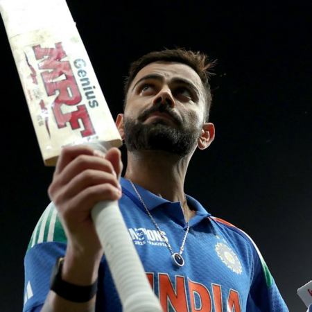 Kohli century puts India on brink of Champions Trophy semis